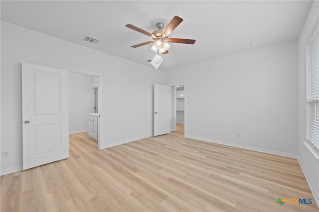 607 Killam Dr, Temple, TX 76502 - unfurnished bedroom with light wood-style flooring, baseboards, and a ceiling fan