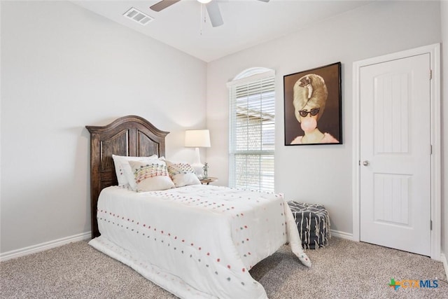 carpeted bedroom with ceiling fan