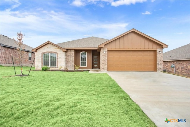 ranch-style house with a front yard and a garage