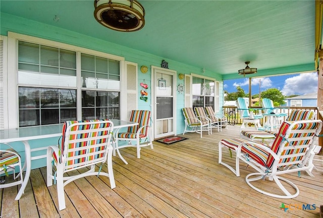 16 Peggy St, Palacios, TX 77465 - deck featuring covered porch