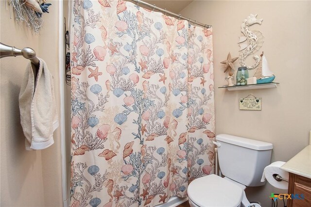 16 Peggy St, Palacios, TX 77465 - bathroom featuring vanity and toilet
