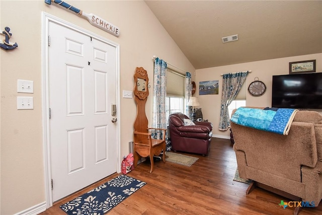 16 Peggy St, Palacios, TX 77465 - entrance foyer with hardwood / wood-style floors and lofted ceiling