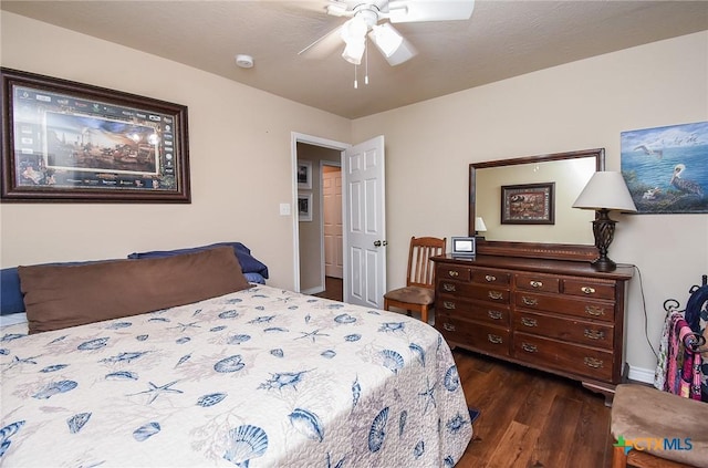 16 Peggy St, Palacios, TX 77465 - bedroom featuring ceiling fan and dark hardwood / wood-style floors