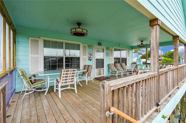 16 Peggy St, Palacios, TX 77465 - wooden deck with covered porch