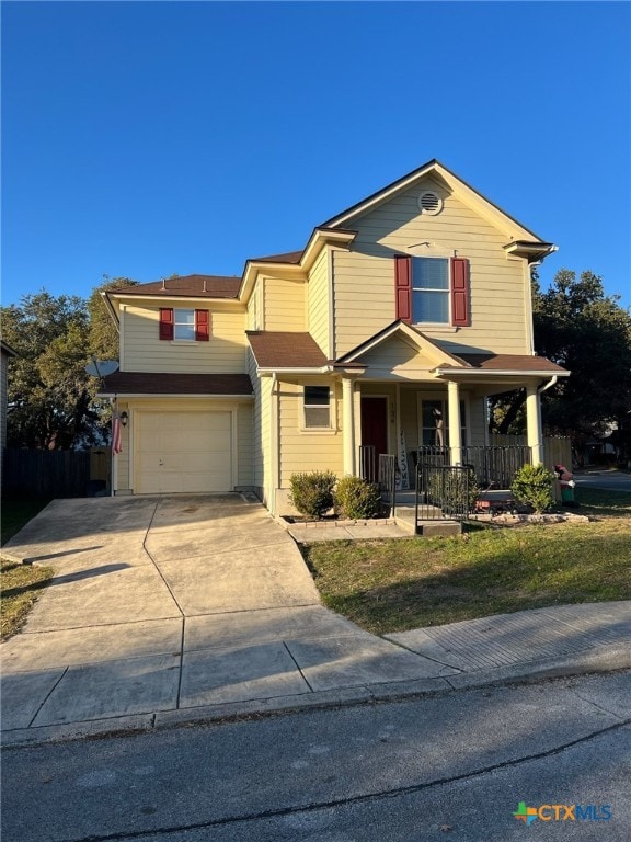 view of front of property with a garage and a porch