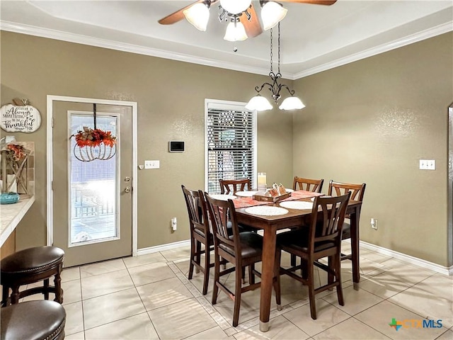 720 E Travis St, Luling, TX 78648 - dining space with healthy amount of natural light, ceiling fan, ornamental molding, and light tile patterned floors