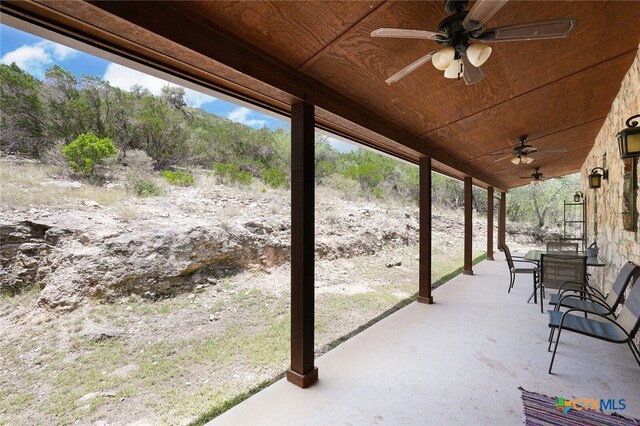 view of patio / terrace featuring ceiling fan