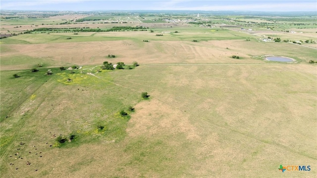 birds eye view of property featuring a rural view
