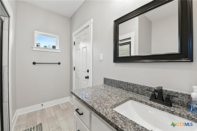 15933 Salado Dr, Temple, TX 76502 - bathroom featuring vanity and wood finished floors