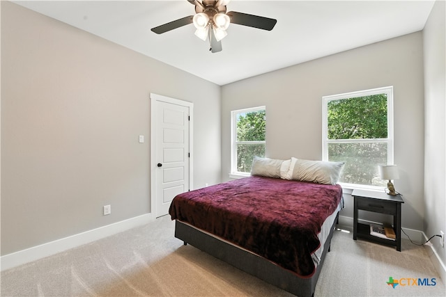 15933 Salado Dr, Temple, TX 76502 - bedroom featuring light carpet and a ceiling fan
