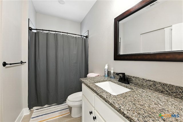 15933 Salado Dr, Temple, TX 76502 - bathroom with vanity, wood finished floors, and curtained shower