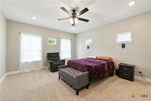 15933 Salado Dr, Temple, TX 76502 - bedroom with light colored carpet, multiple windows, recessed lighting, and ceiling fan