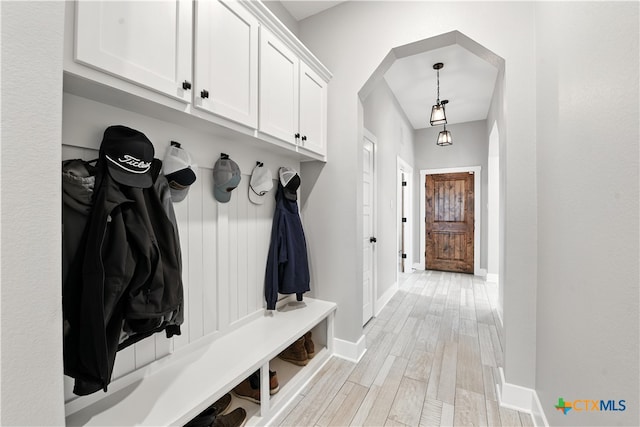 15933 Salado Dr, Temple, TX 76502 - mudroom with arched walkways and light wood finished floors