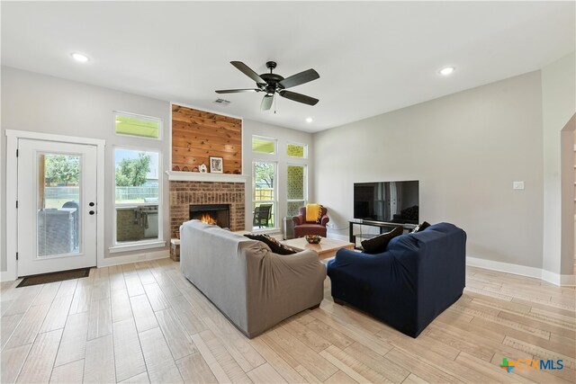 15933 Salado Dr, Temple, TX 76502 - living area featuring a ceiling fan, light wood finished floors, recessed lighting, and a fireplace