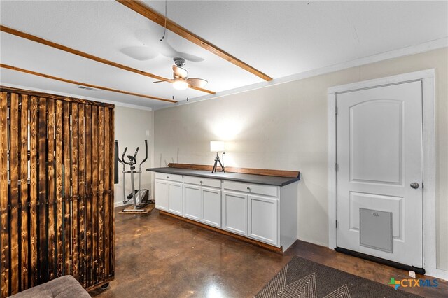 1975 Taylorsville Rd, Red Rock, TX 78662 - interior space featuring white cabinets, dark countertops, visible vents, a ceiling fan, and concrete flooring