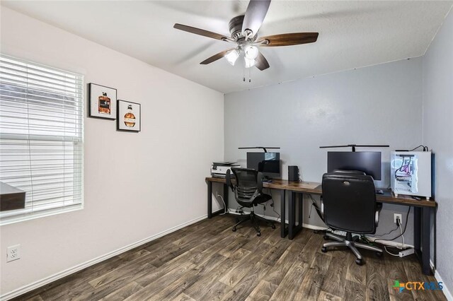 office area featuring wood finished floors, baseboards, and ceiling fan