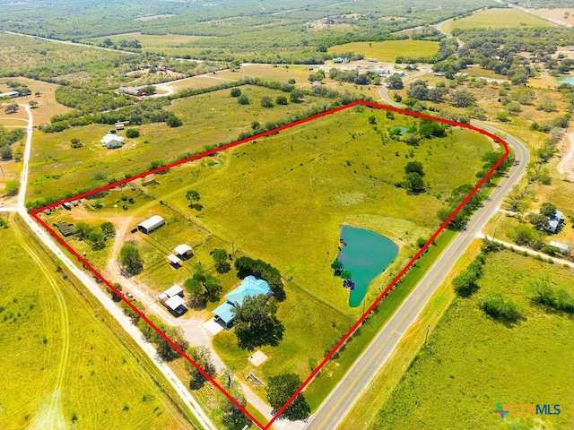 aerial view featuring a water view and a rural view