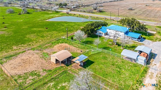 bird's eye view with a water view and a rural view