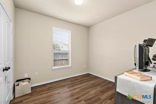 interior space featuring dark wood-type flooring