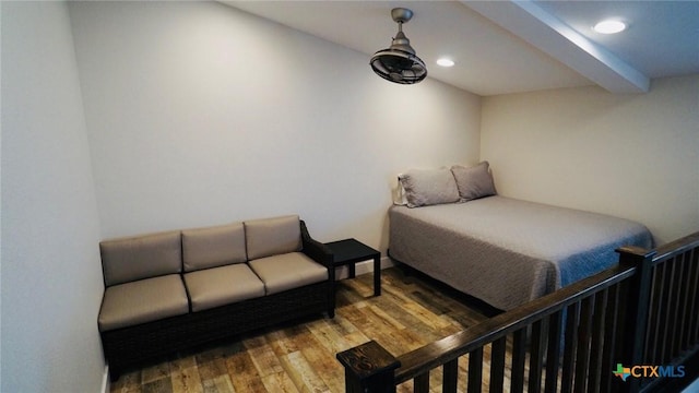 1206 W Commerce St, Port Oconnor, TX 77982 - bedroom featuring beam ceiling, wood finished floors, and recessed lighting