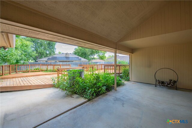 view of patio / terrace featuring a wooden deck