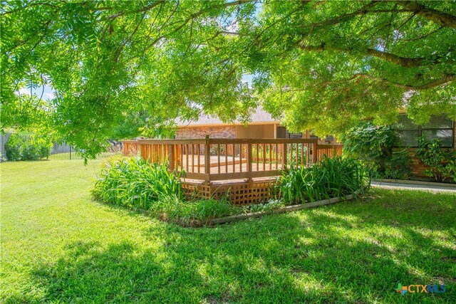 view of yard featuring a deck