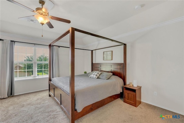 116 Bufflehead Ln, Leander, TX 78641 - bedroom with light colored carpet, crown molding, baseboards, and ceiling fan