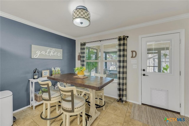 116 Bufflehead Ln, Leander, TX 78641 - dining space featuring crown molding and baseboards