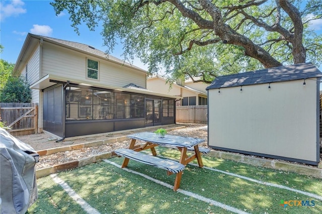 116 Bufflehead Ln, Leander, TX 78641 - back of property featuring a sunroom