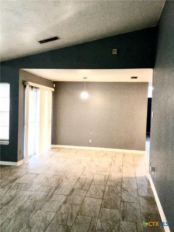2004 Sherman Dr, Killeen, TX 76543 - unfurnished room with lofted ceiling and baseboards