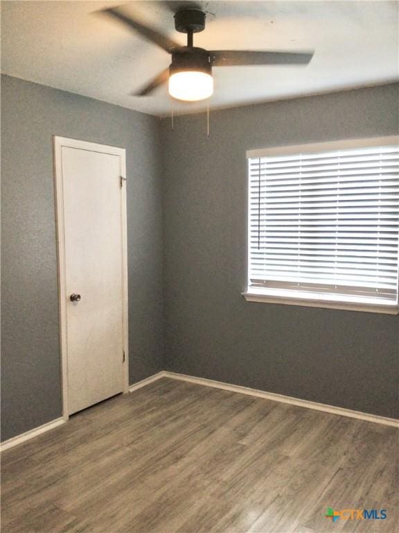 2004 Sherman Dr, Killeen, TX 76543 - spare room featuring a ceiling fan and wood finished floors