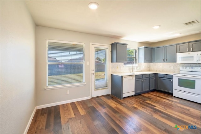 4912 Donegal Bay Ct, Killeen, TX 76549 - kitchen featuring white appliances, gray cabinets, decorative backsplash, light countertops, and recessed lighting