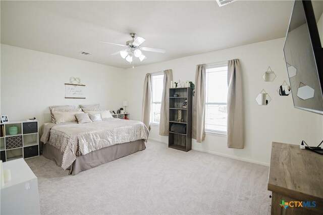 201 Boulder Ridge Dr, Cuero, TX 77954 - carpeted bedroom featuring ceiling fan and baseboards