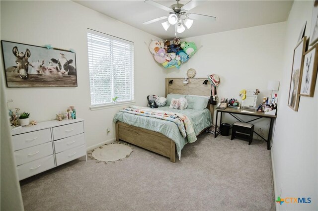 201 Boulder Ridge Dr, Cuero, TX 77954 - bedroom featuring carpet floors, a ceiling fan, and baseboards
