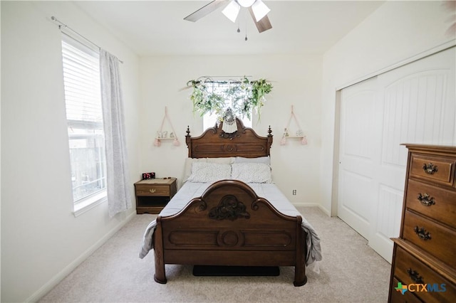 201 Boulder Ridge Dr, Cuero, TX 77954 - bedroom with multiple windows, light carpet, and baseboards