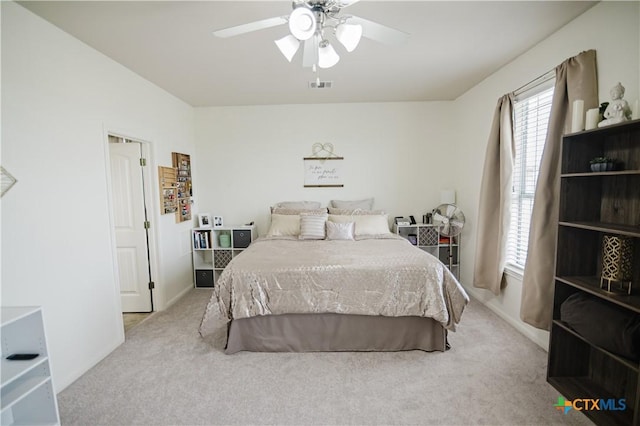 201 Boulder Ridge Dr, Cuero, TX 77954 - carpeted bedroom with a ceiling fan and baseboards