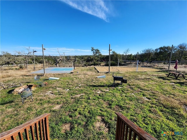 view of yard with volleyball court