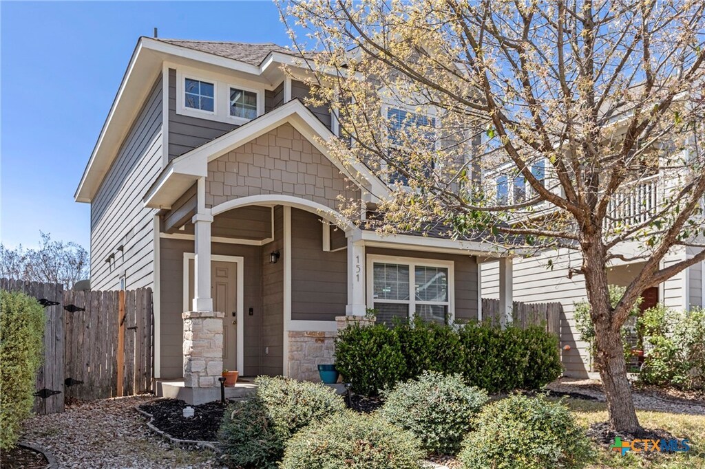151 Gambel Oak Way, San Marcos, TX 78666 - view of front of property featuring stone siding and fence