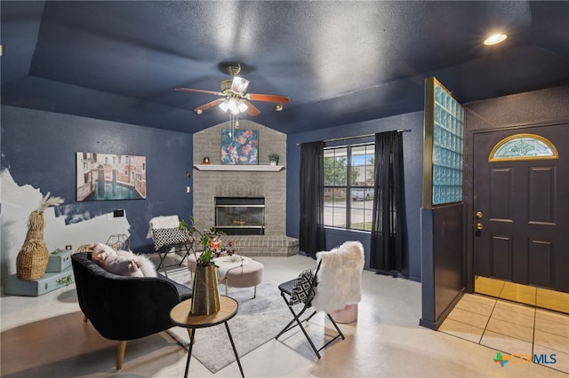 1062 Rolling Path, New Braunfels, TX 78130 - living area featuring lofted ceiling, ceiling fan, and a brick fireplace