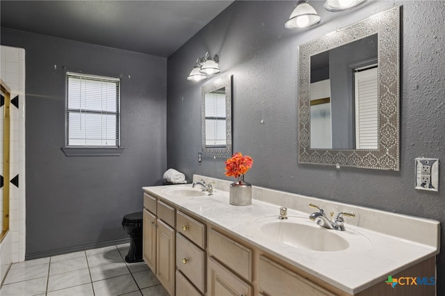 1062 Rolling Path, New Braunfels, TX 78130 - bathroom featuring double vanity, tile patterned floors, and a shower