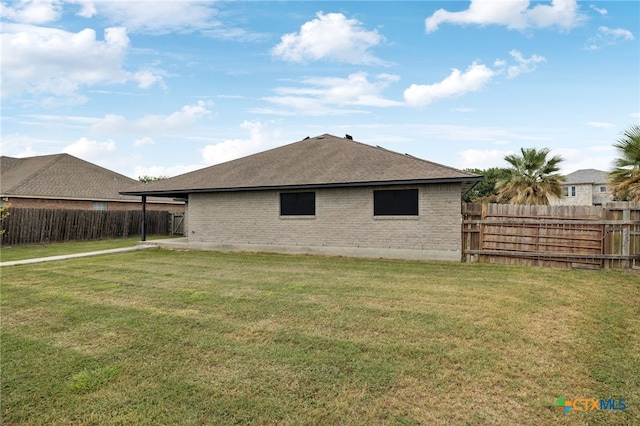 1062 Rolling Path, New Braunfels, TX 78130 - back of property with brick siding, a fenced backyard, and a shingled roof
