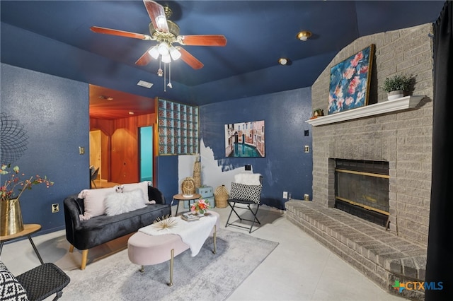 1062 Rolling Path, New Braunfels, TX 78130 - living room featuring a ceiling fan and a fireplace