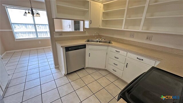 601 Barber Dr, Copperas Cove, TX 76522 - kitchen featuring stainless steel dishwasher, open shelves, a sink, and light tile patterned floors