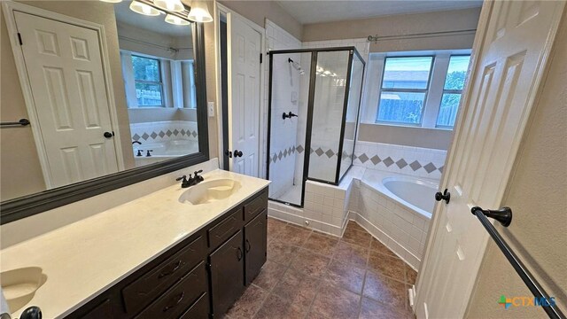 601 Barber Dr, Copperas Cove, TX 76522 - full bath featuring a stall shower, vanity, a garden tub, and tile patterned flooring