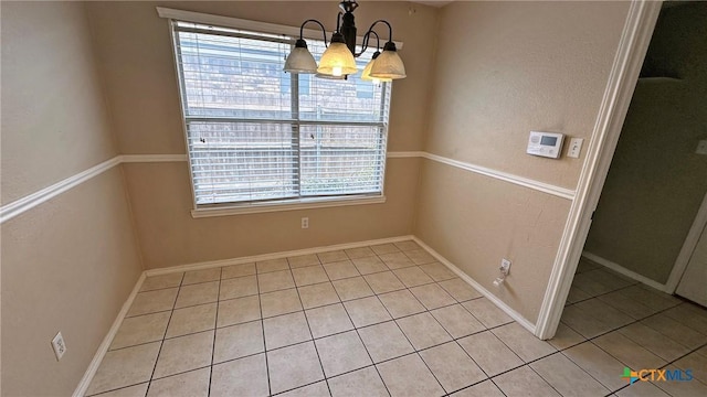 601 Barber Dr, Copperas Cove, TX 76522 - unfurnished dining area featuring healthy amount of natural light, light tile patterned floors, and a chandelier