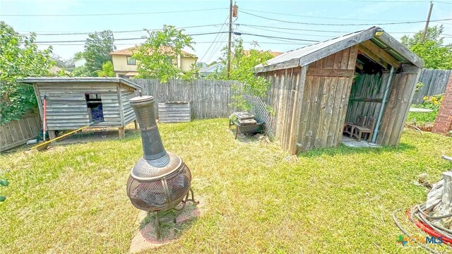 601 Barber Dr, Copperas Cove, TX 76522 - view of yard with a storage unit and an outbuilding