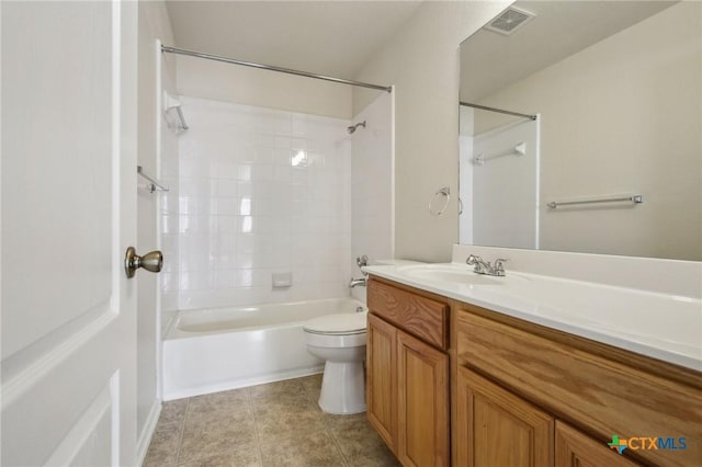 full bath with toilet, vanity, washtub / shower combination, and tile patterned flooring