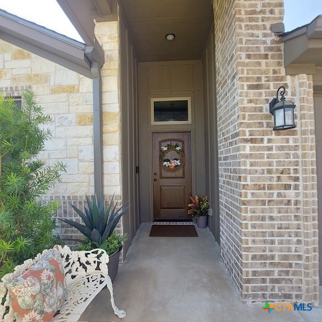 1802 Rustic Manor Dr, Temple, TX 76502 - entrance to property featuring brick siding