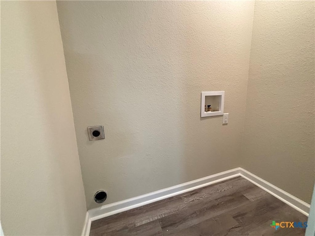 708 E 5th St, Nixon, TX 78140 - washroom featuring electric dryer hookup, dark wood-style flooring, and hookup for a washing machine