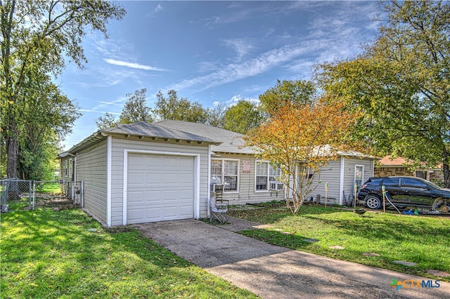 ranch-style house with a garage and a front yard